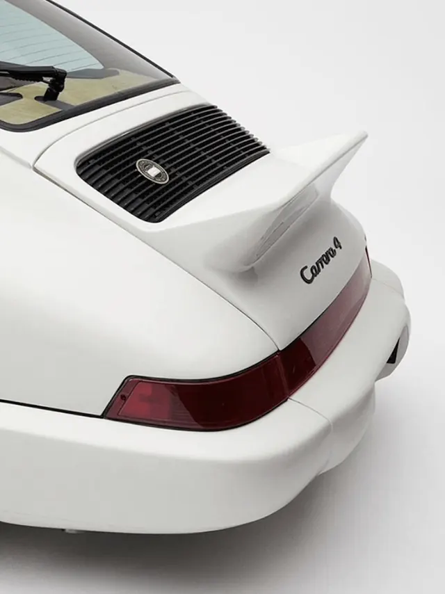 White Porsche 911 Carrera 4 rear detail, minimal, photographic, light