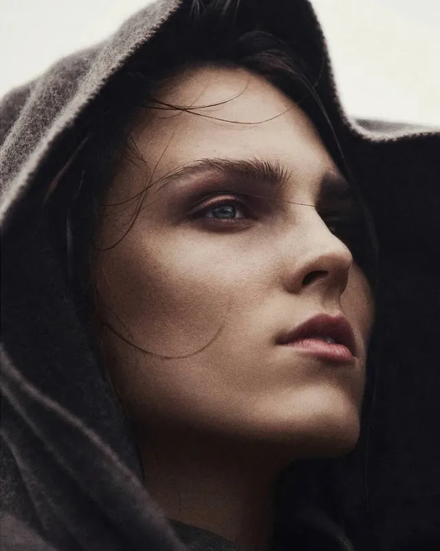 Warm-toned editorial portrait with subtle detail, photographic, editorial, warm