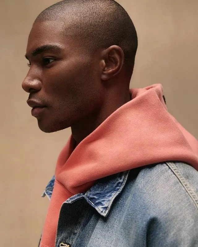 Warm-toned editorial portrait, photographic, warm