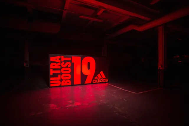 Adidas Ultra Boost 19 warehouse lightbox, brutalist, dark-mode, dark
