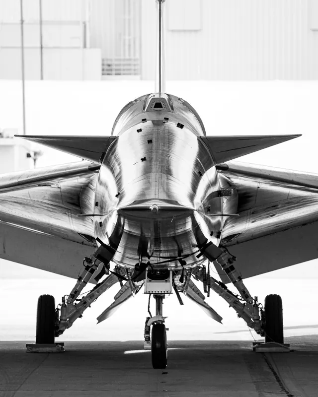 Fighter jet nose-on monochrome photo, technical, photographic, monochrome