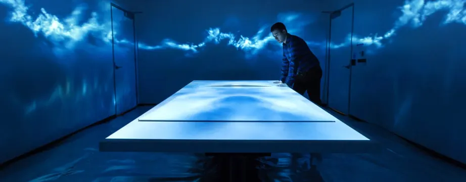 Projection-mapped conference room installation, technical, photographic, dark