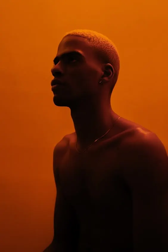 Portrait with warm ambient lighting, photographic, minimal, warm
