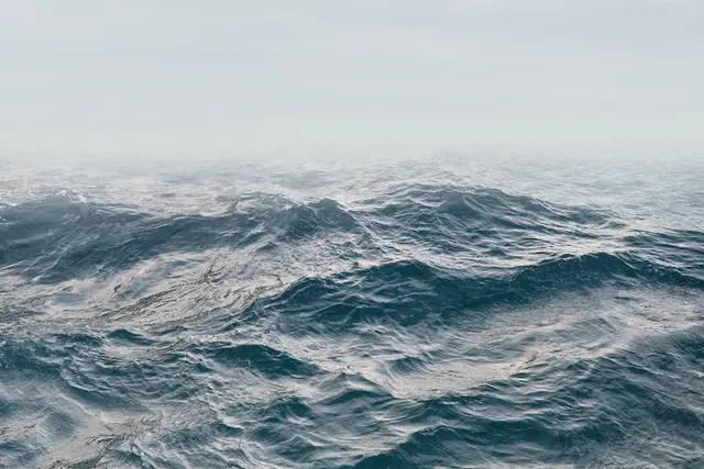 Moody teal ocean waves, photographic, minimal, cool