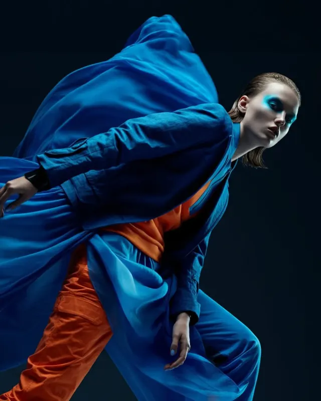 Blue and orange fashion motion portrait, editorial, photographic, vibrant