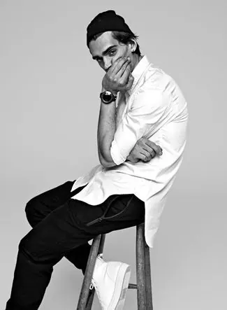 Monochrome fashion portrait on stool, minimal, photographic, monochrome