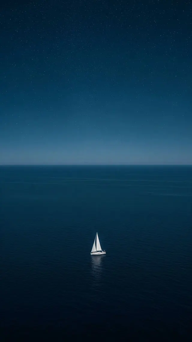 Sailboat on Dark Blue Sea