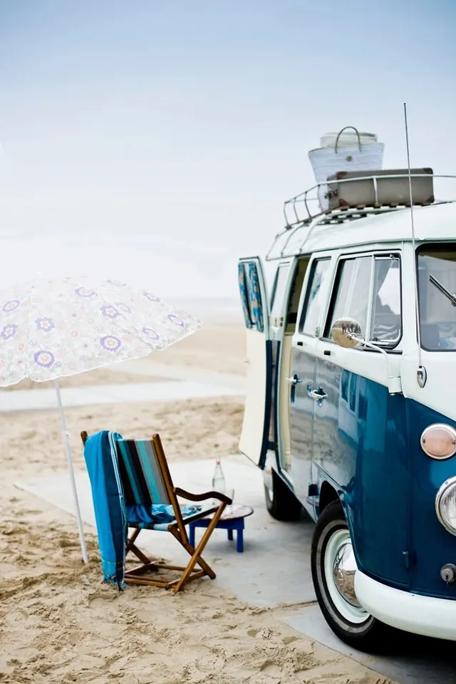 Blue Vintage Camper on Beach