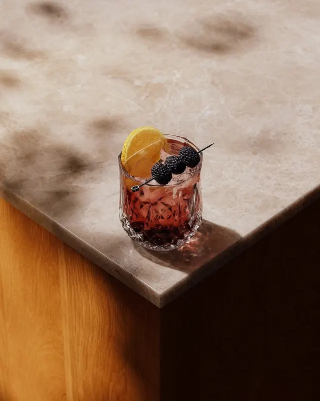 Berry Cocktail on Stone Surface