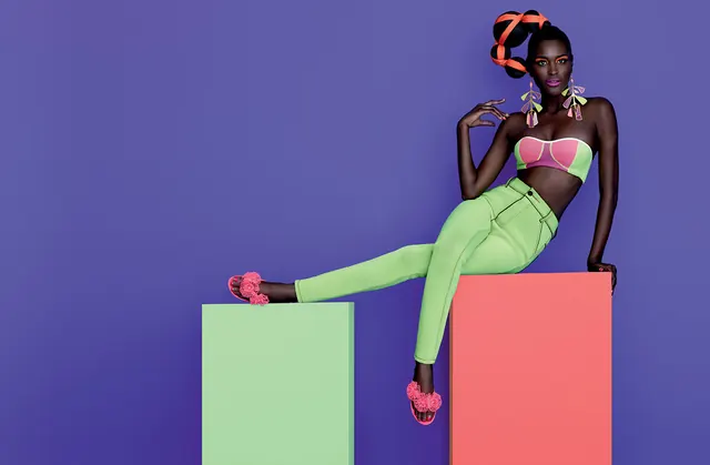 Fashion portrait with bold color blocking, photographic, playful, vibrant