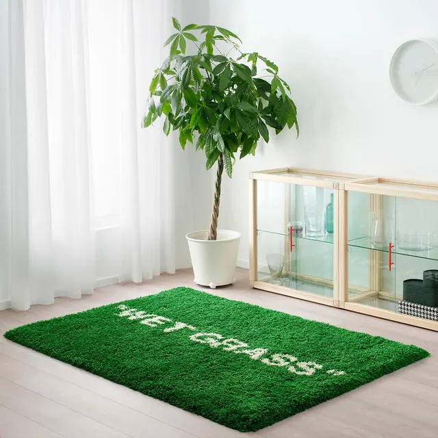 Minimalist interior with green topiary and moss mat, photographic, minimalist, light