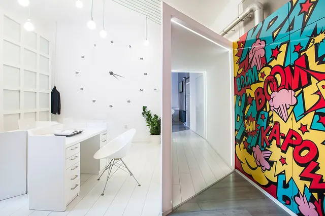 Minimalist White Interior with Graphic Mural