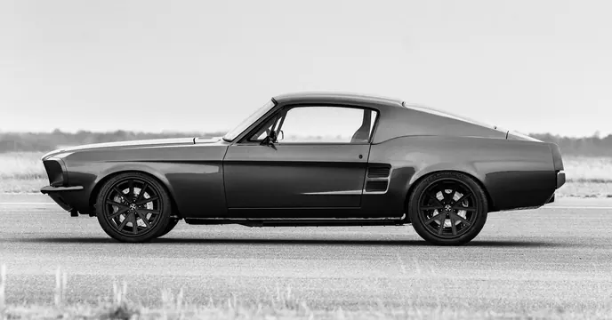 Classic muscle car profile photograph, black and white, photographic, minimalist, monochrome