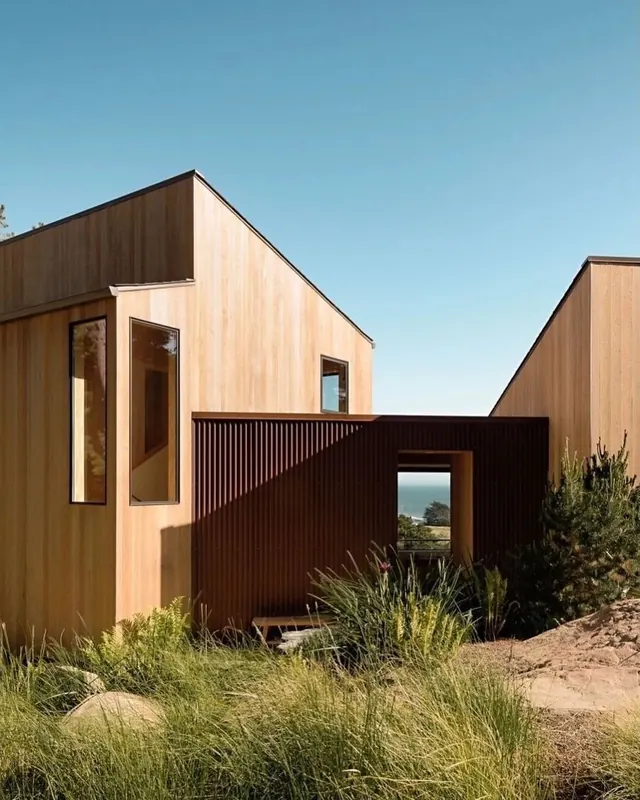 Modern angular home with corten and cedar, architectural, modern, warm