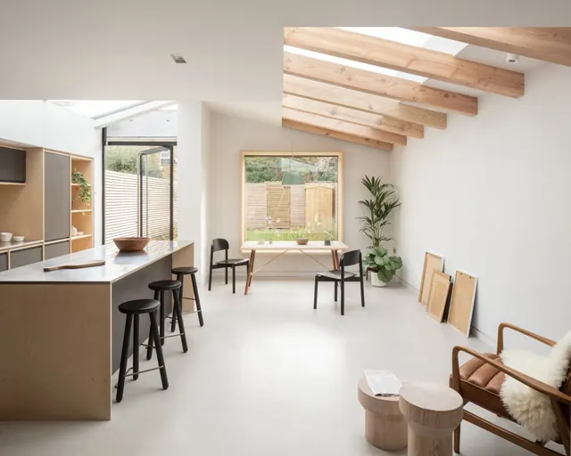 Modern minimalist open-plan interior, architectural, minimalist, warm