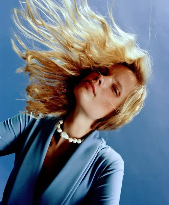 Dynamic fashion portrait with motion, photographic, fashion, vibrant