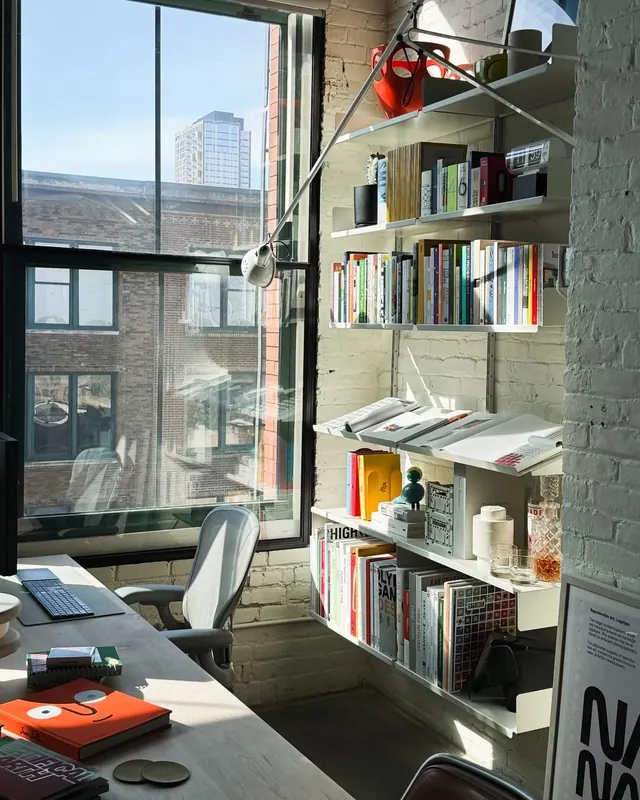 Industrial workspace with built-in shelving, photographic, minimal, light