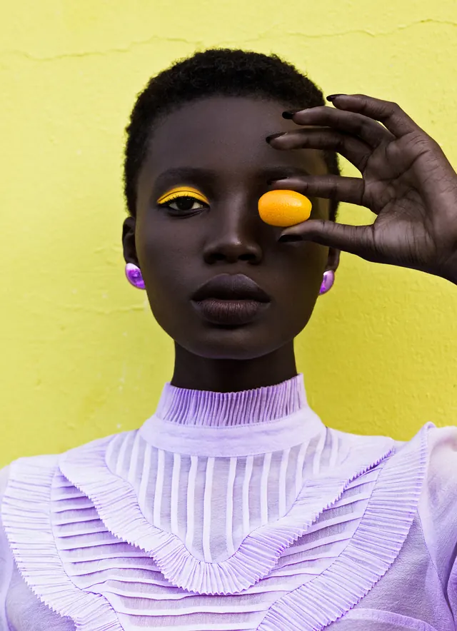Editorial fashion portrait with bold color blocking, photographic, editorial, vibrant