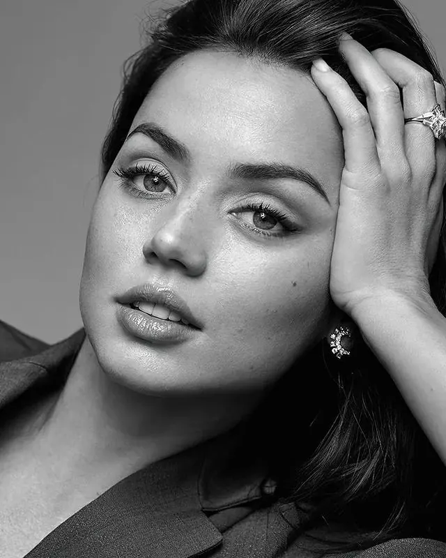 Portrait headshot of woman in neutral monochrome, photographic, minimal, monochrome
