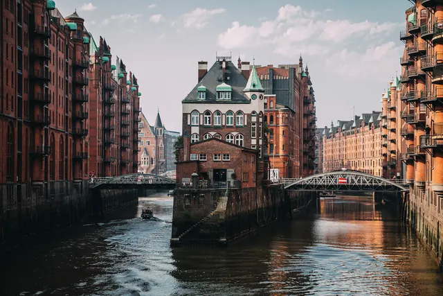Historic waterfront architecture Hamburg canals, photographic, organic, warm
