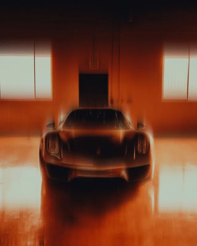 Dark supercar in warm garage lighting, photographic, dark-mode, dark