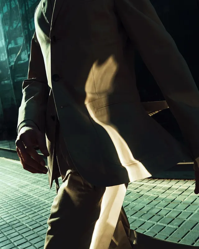 Fashion detail with dramatic lighting and shadows, photographic, editorial, warm