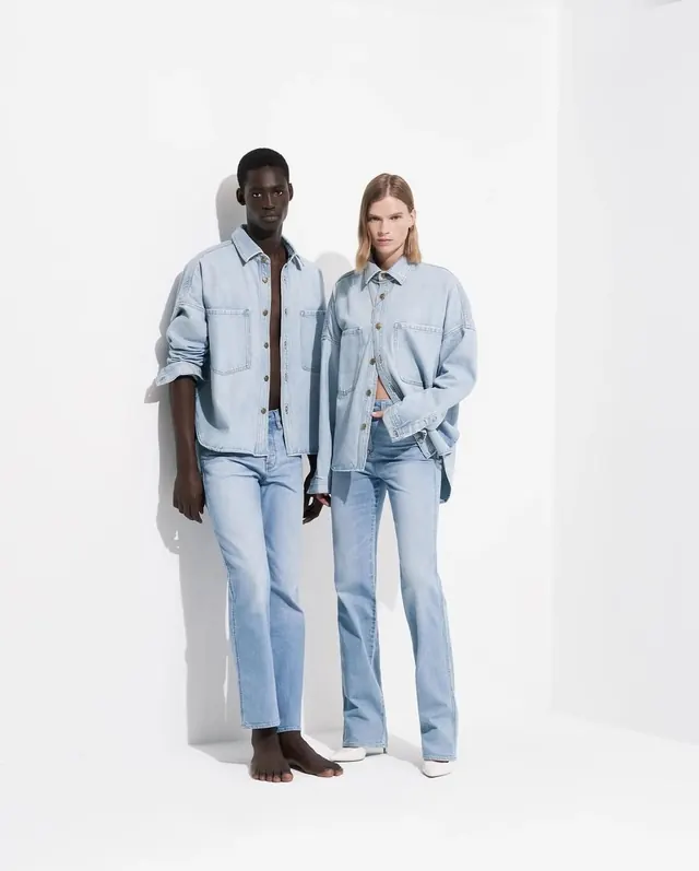 Denim campaign with duo model posed neutrally, photographic, minimal, light