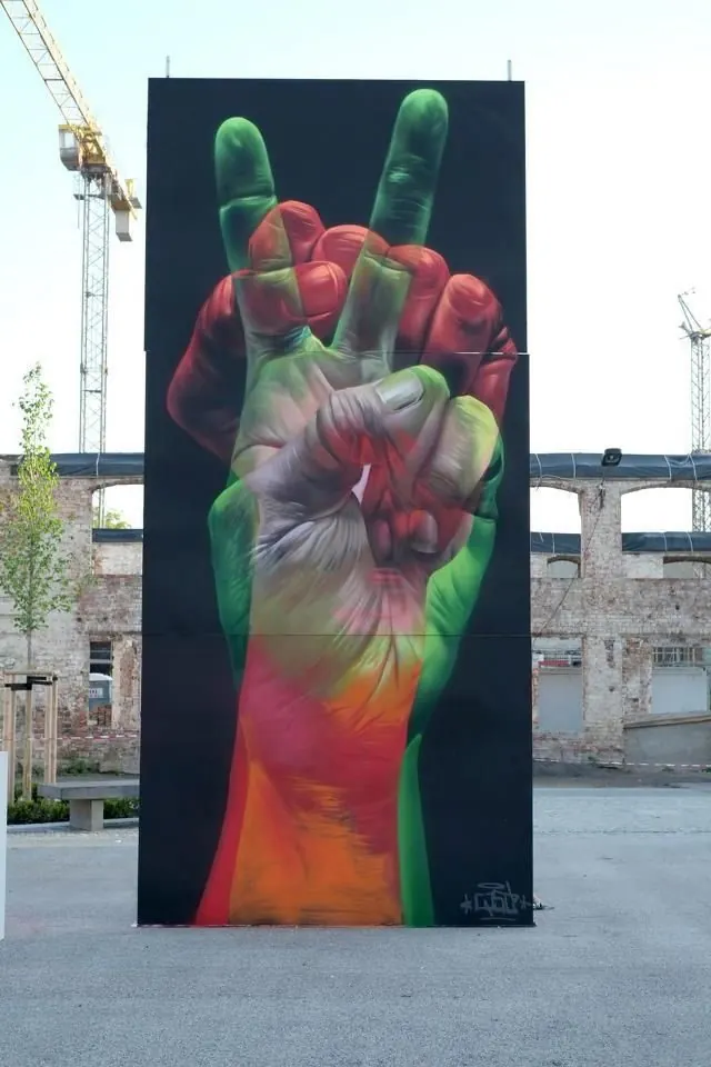 Large-scale street art peace hand, photographic, illustrated, vibrant