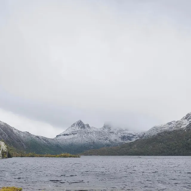 Mountain lake in mist, photographic, cool