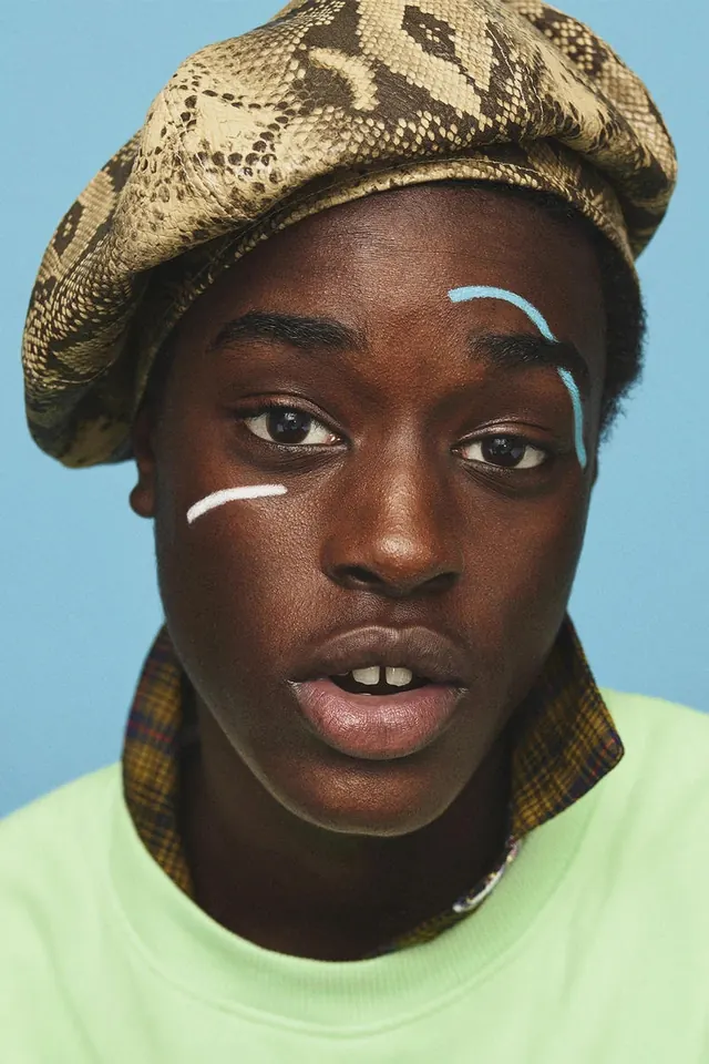 Portrait with bold graphic makeup and fashion, photographic, bold, vibrant