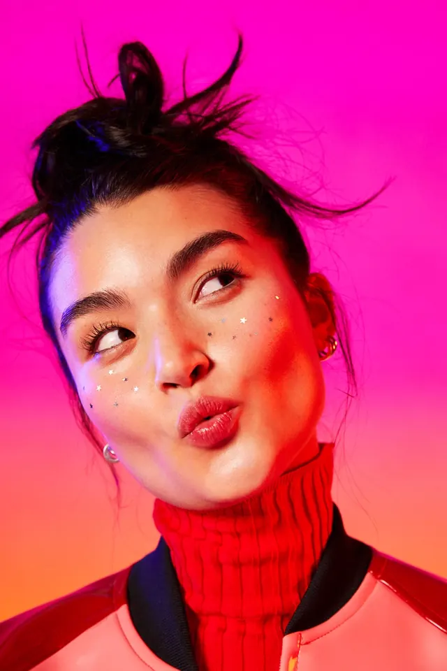 Bold beauty portrait with neon color lighting, photographic, bold, vibrant