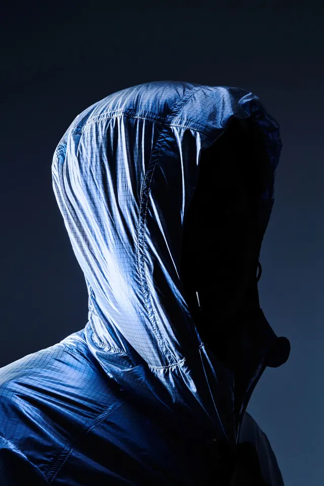 Draped blue fabric head study, photographic, minimal, cool