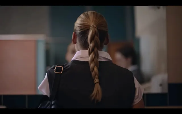 Film still school uniform back view, photographic, minimalist, dark
