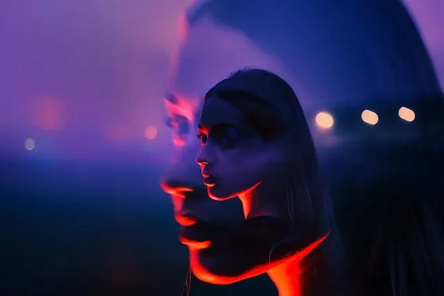 Portrait with neon red and purple color grading, photographic, technical, vibrant