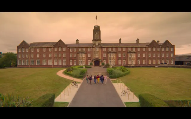 Brick institutional building with symmetrical approach, photographic, corporate-clean, warm