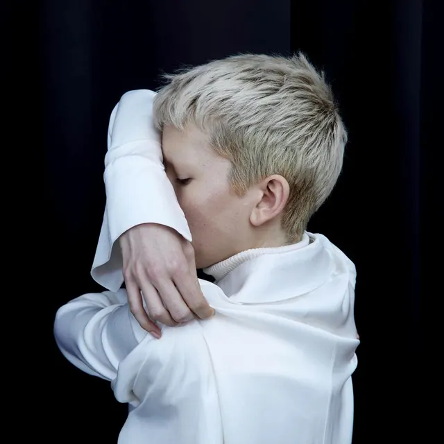 Child portrait with dramatic backlighting, photographic, minimal, light