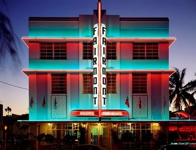 Art Deco neon-lit building facade, retro, photographic, neon