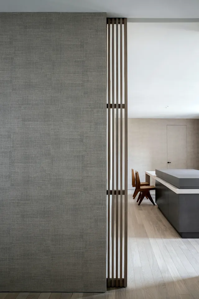 Modern room divider with vertical slat design, minimalist, corporate-clean, light