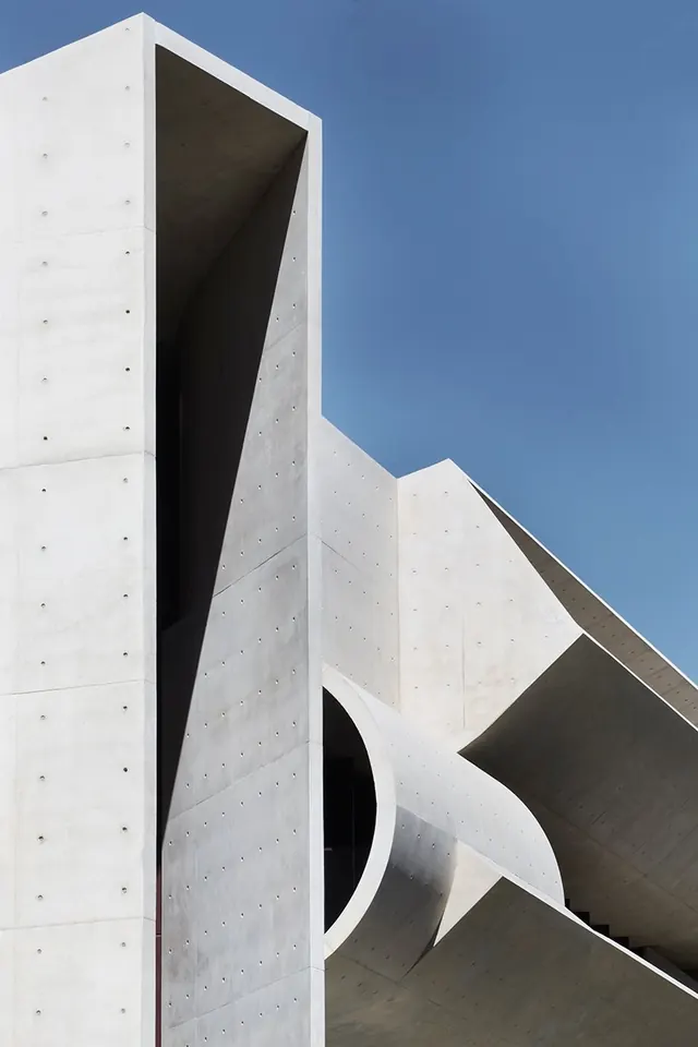 Modern concrete architecture geometric forms, photographic, brutalist, light