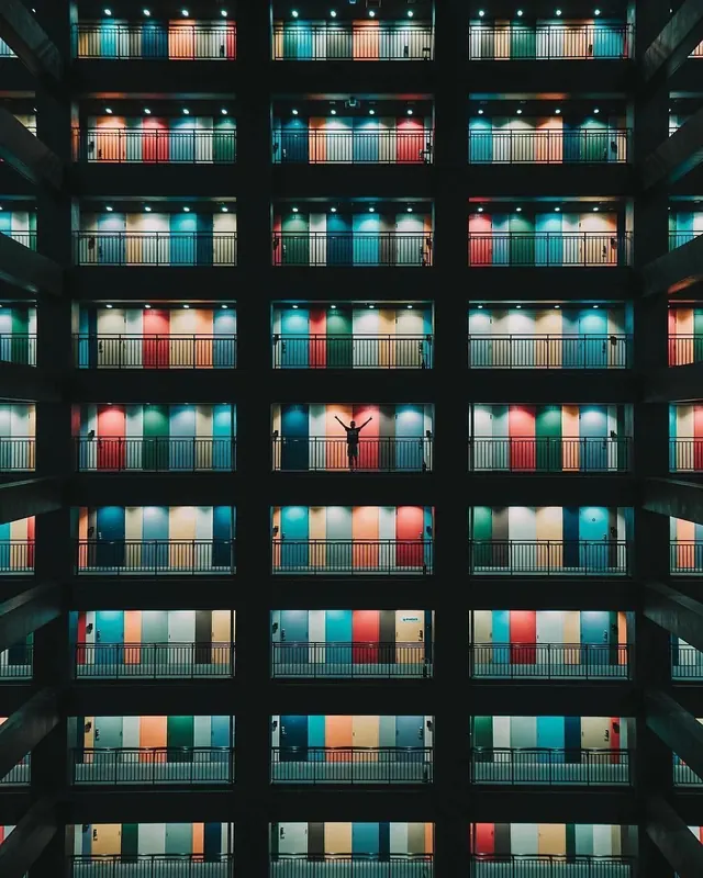 Apartment building facade aerial grid pattern, photographic, geometric, cool