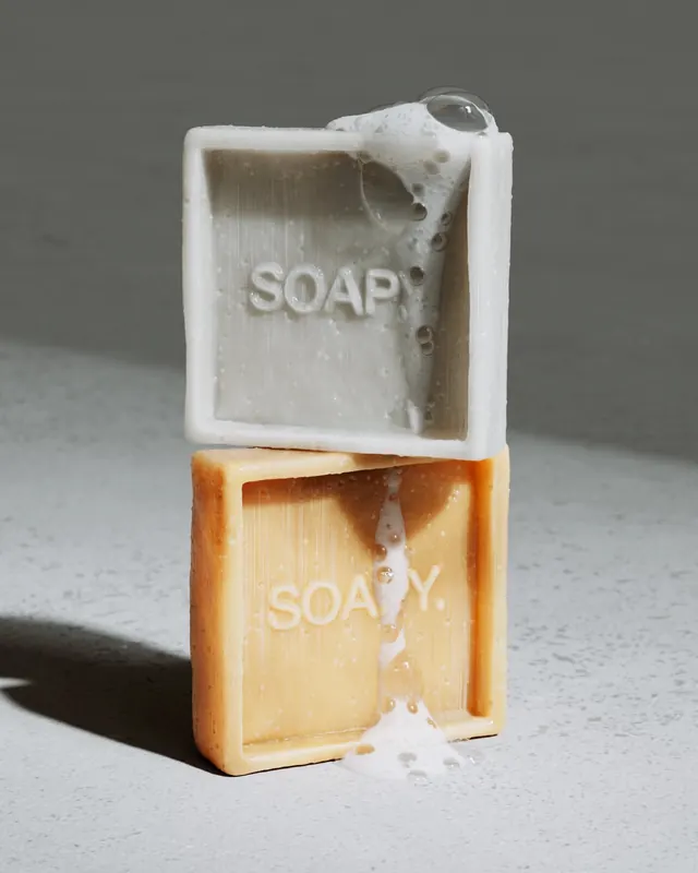 Minimalist soap bar stacked product shot, photographic, minimal, light