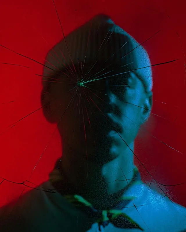 Surreal portrait with geometric lines and red-blue duotone, photographic, surreal, dark