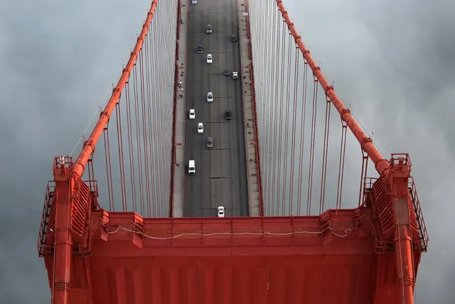 Golden Gate Bridge overhead symmetrical view, photographic, geometric, warm