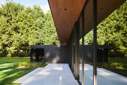 Contemporary terrace with glass and wood, photographic, minimal, earthy