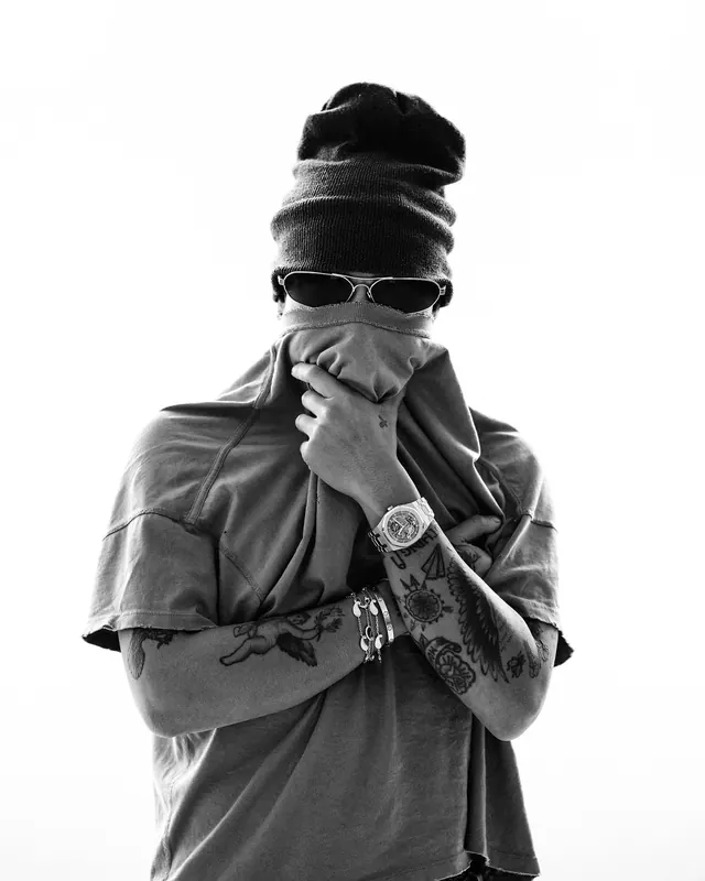 Monochrome fashion portrait with head wrap and sunglasses, photographic, minimalist, monochrome