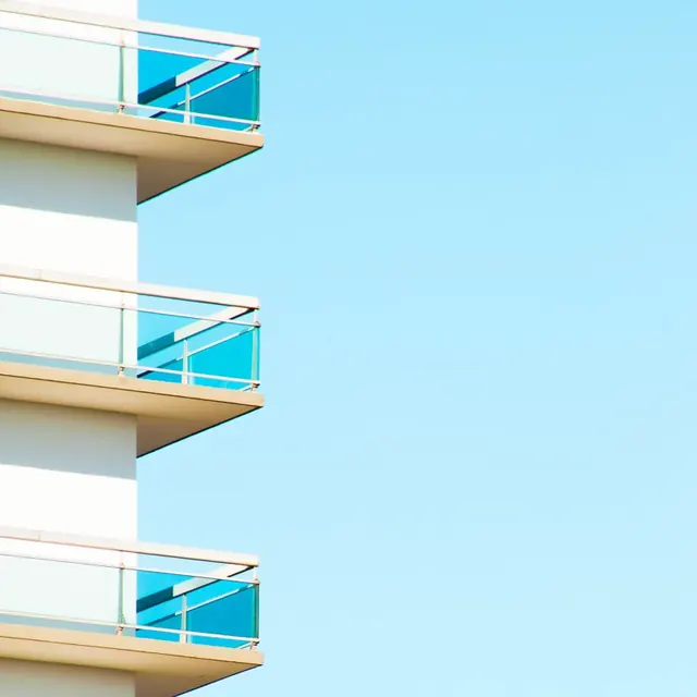 Mid-century balconies with sky blue background, architectural, photographic, cool