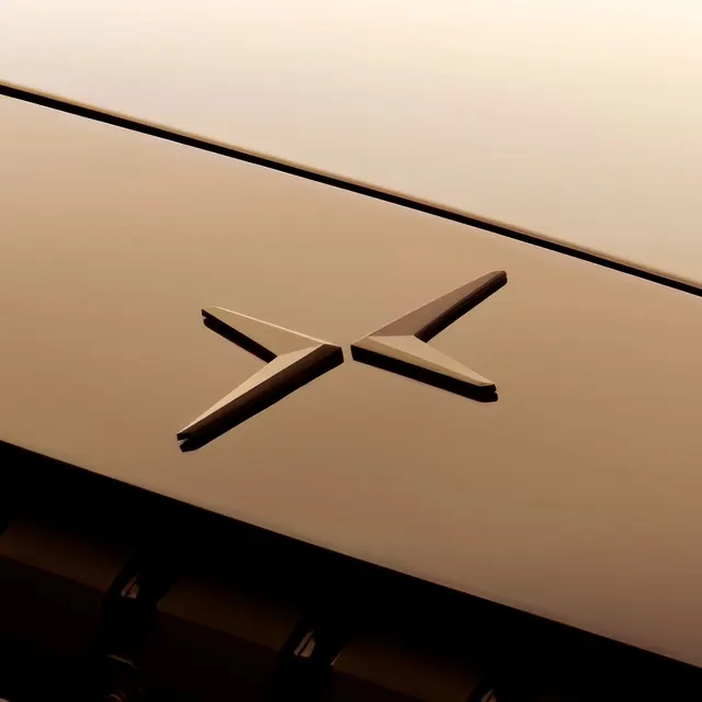 X symbol on angled architectural surface, architectural, minimalist, warm