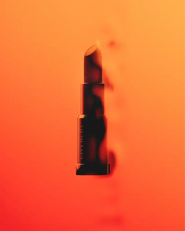 Luxury lipstick product shot on gradient orange-red background, photographic, bold, warm