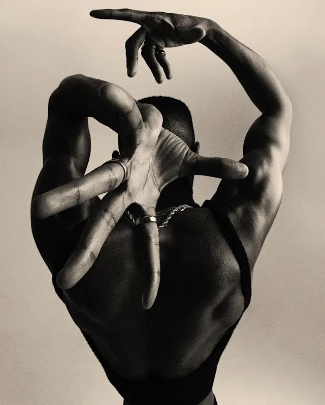 Black and white hand composition study, photographic, editorial, dark