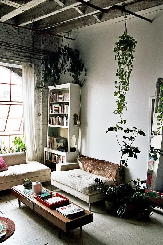 Industrial loft with abundant greenery and daylight, organic, brutalist, warm
